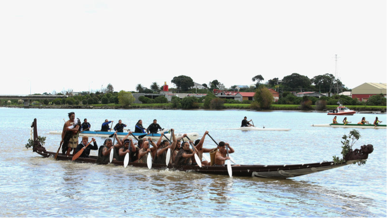 Māori paddlers guide a boat down the Whanganui River in New Zealand, during a visit from Britain's Prince Harry in 2015.